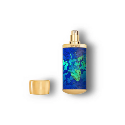 Perfume bottle with blue and green pattern on a white background