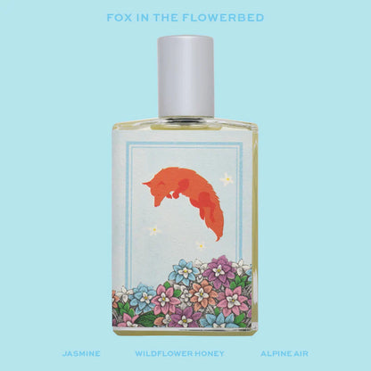 Fox In The Flowerbed