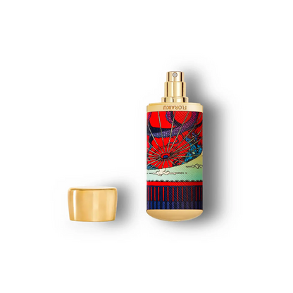 Colorful perfume bottle with gold cap on a white background
