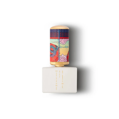 Colorful cylindrical product with a pattern on a white base, featuring the brand 'Floraflo'.