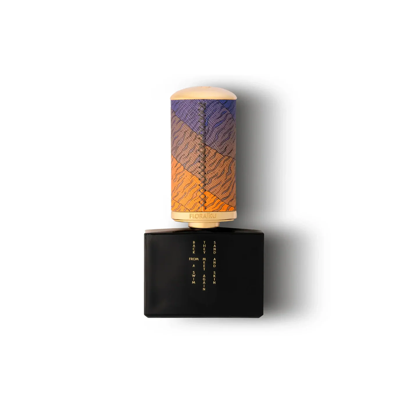 Perfume bottle with a colorful cap on a white background